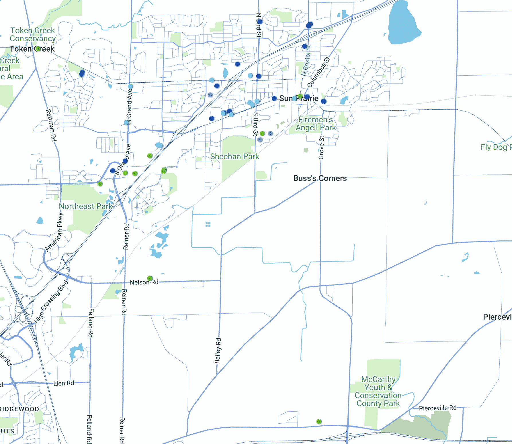 A map of Sun Prairie, Wisconsin, showing major roads, parks, and markers in blue, green, purple, and red throughout the city area.